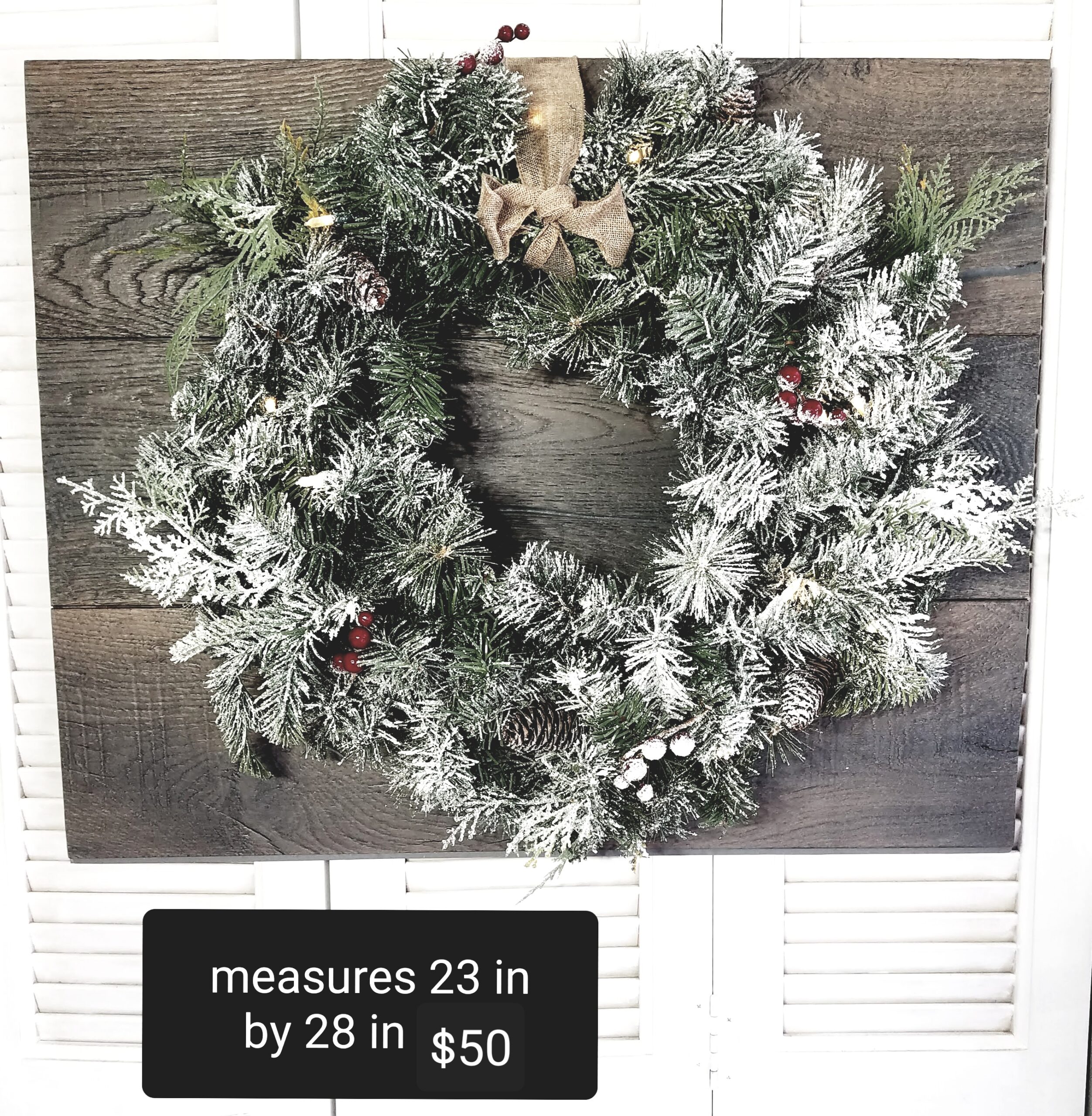 Christmas Lighted Wreath on Gray Rustic Wood