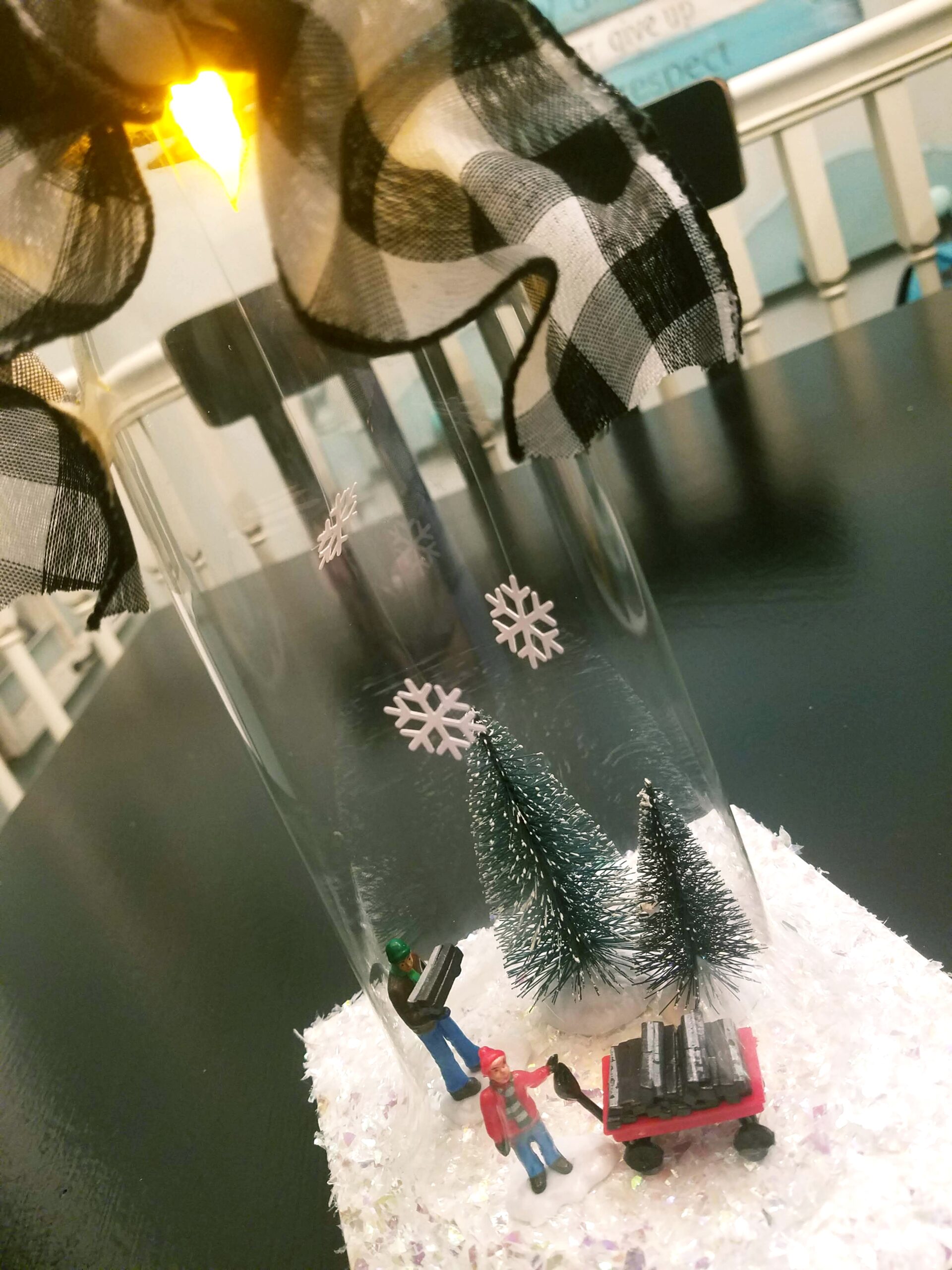 Lighted Glass Christmas Globe with Figurines & Sparkly Snow - Image 2