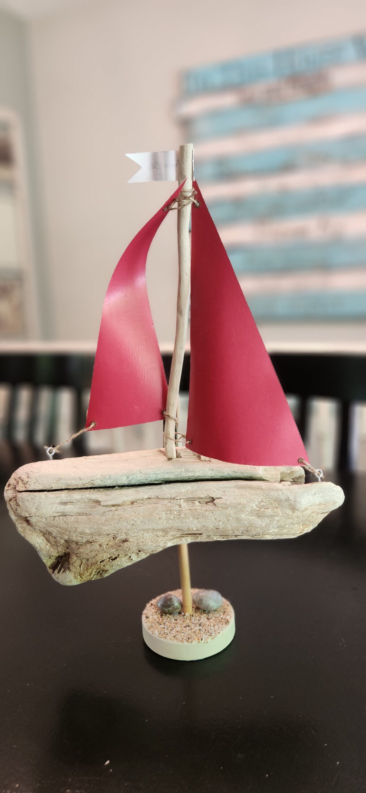 A Unique Sailboat Crafted from Driftwood, Petoskey Stones, Sand, Map Sails and Traverse City Flag - Image 2