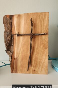 Barbwire cross with live edge