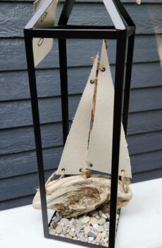 Lantern with Driftwood Sailboat & Beach Stones