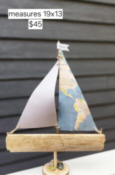 A Unique Sailboat Crafted from Driftwood, Petoskey Stones, Sand, Map Sails & Michigan Flag