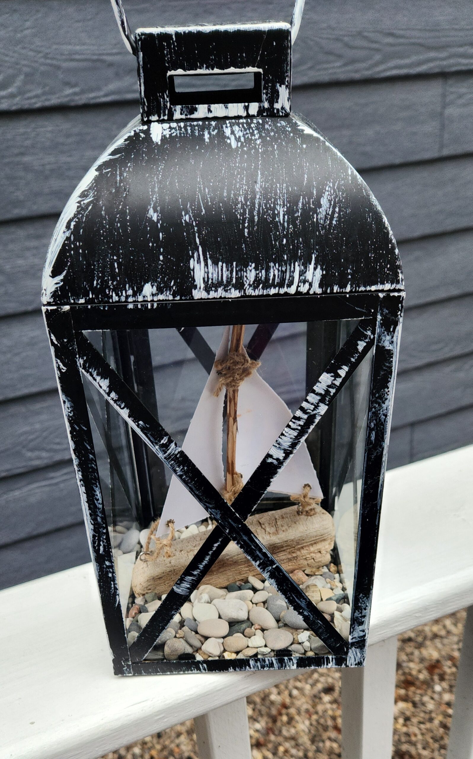 Lantern with Driftwood Sailboat, Beach Stones & Traverse City Flag - Image 3