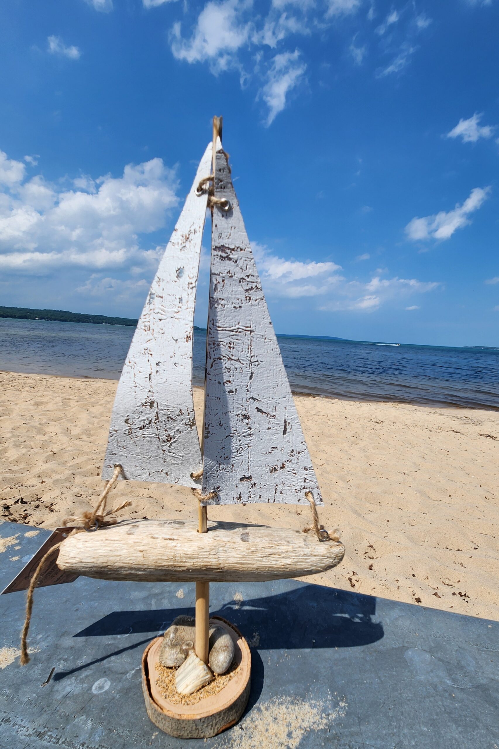 Handcrafted Driftwood Sailboat Decor with Natural Stones and Sand – Coastal Beach Art